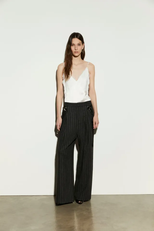 Isabelle Blanche pantaloni evazati negri lana S